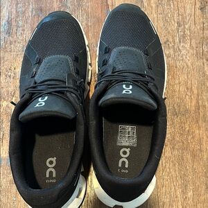 On Running Black and White Athletic Shoes